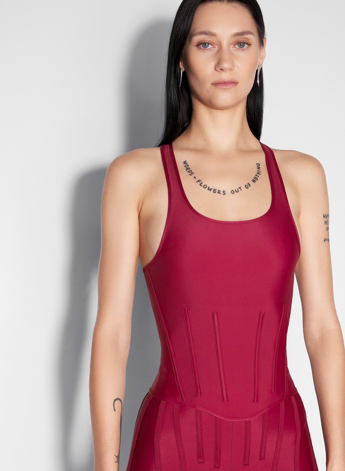 red corseted tank top