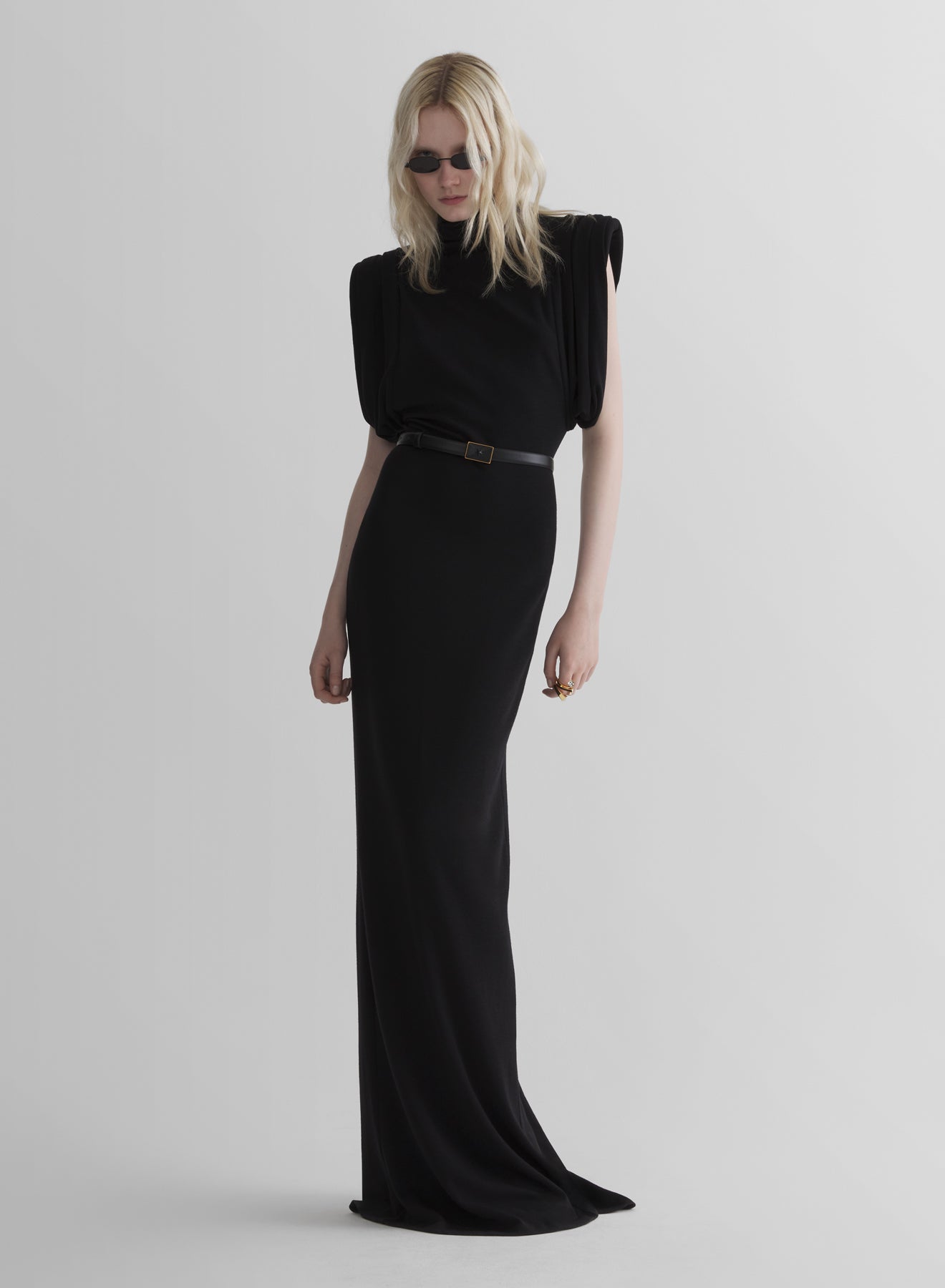 black draped sleeveless gown