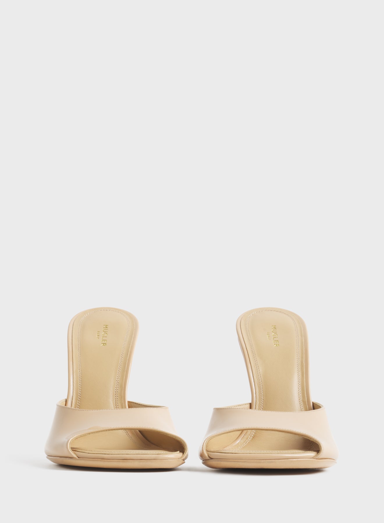 Tan peep-toe mules 105