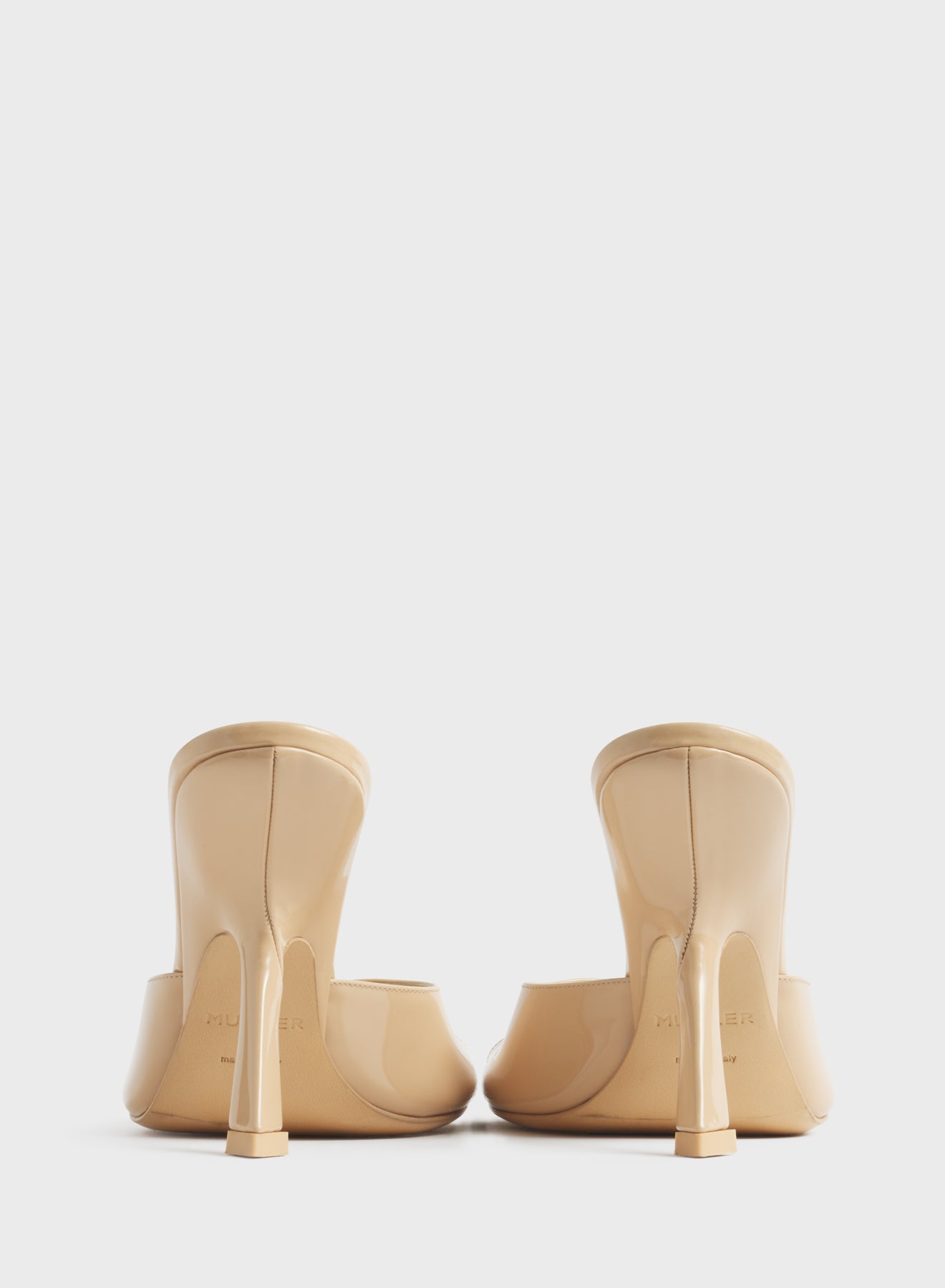 Tan peep-toe mules 105