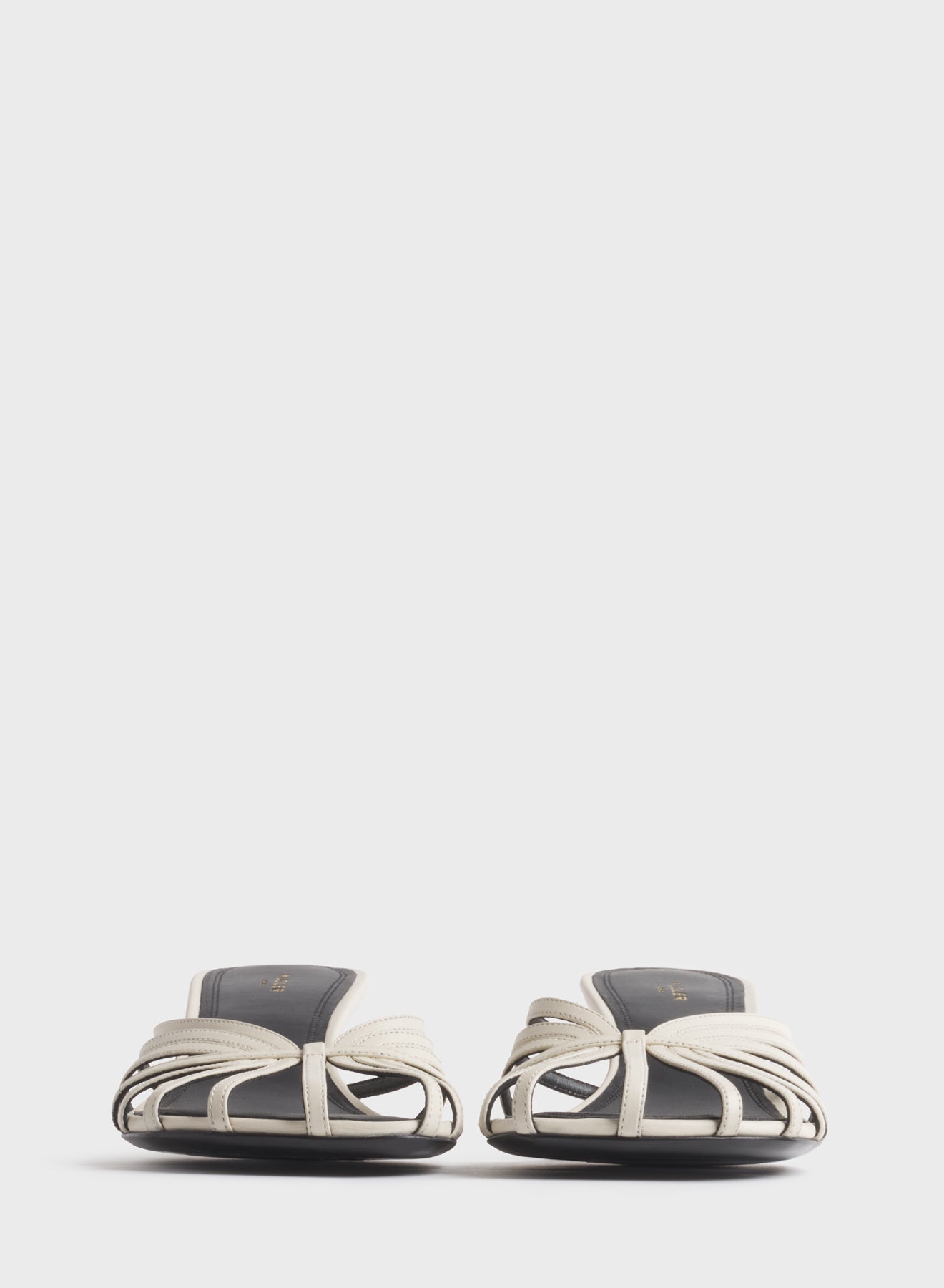 White knotted strap mules 45