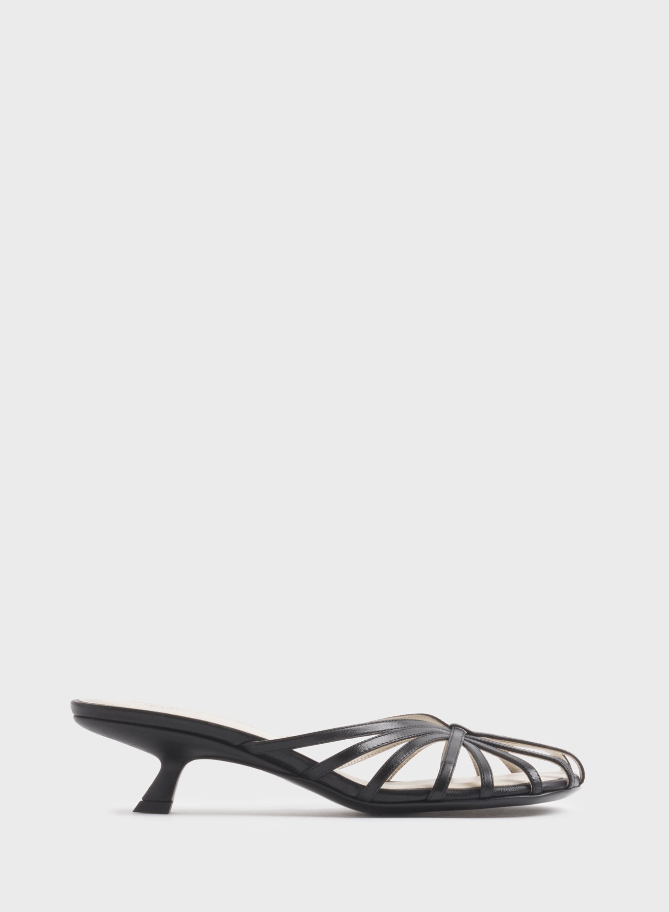 Black knotted strap mules 45