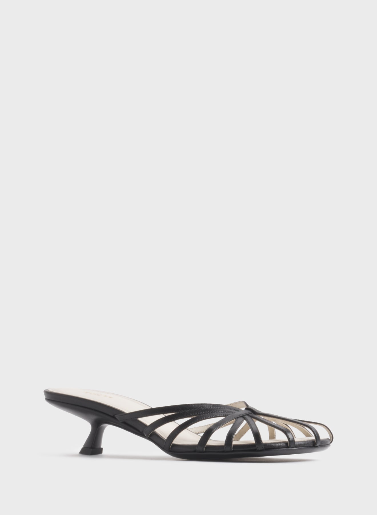 Black knotted strap mules 45