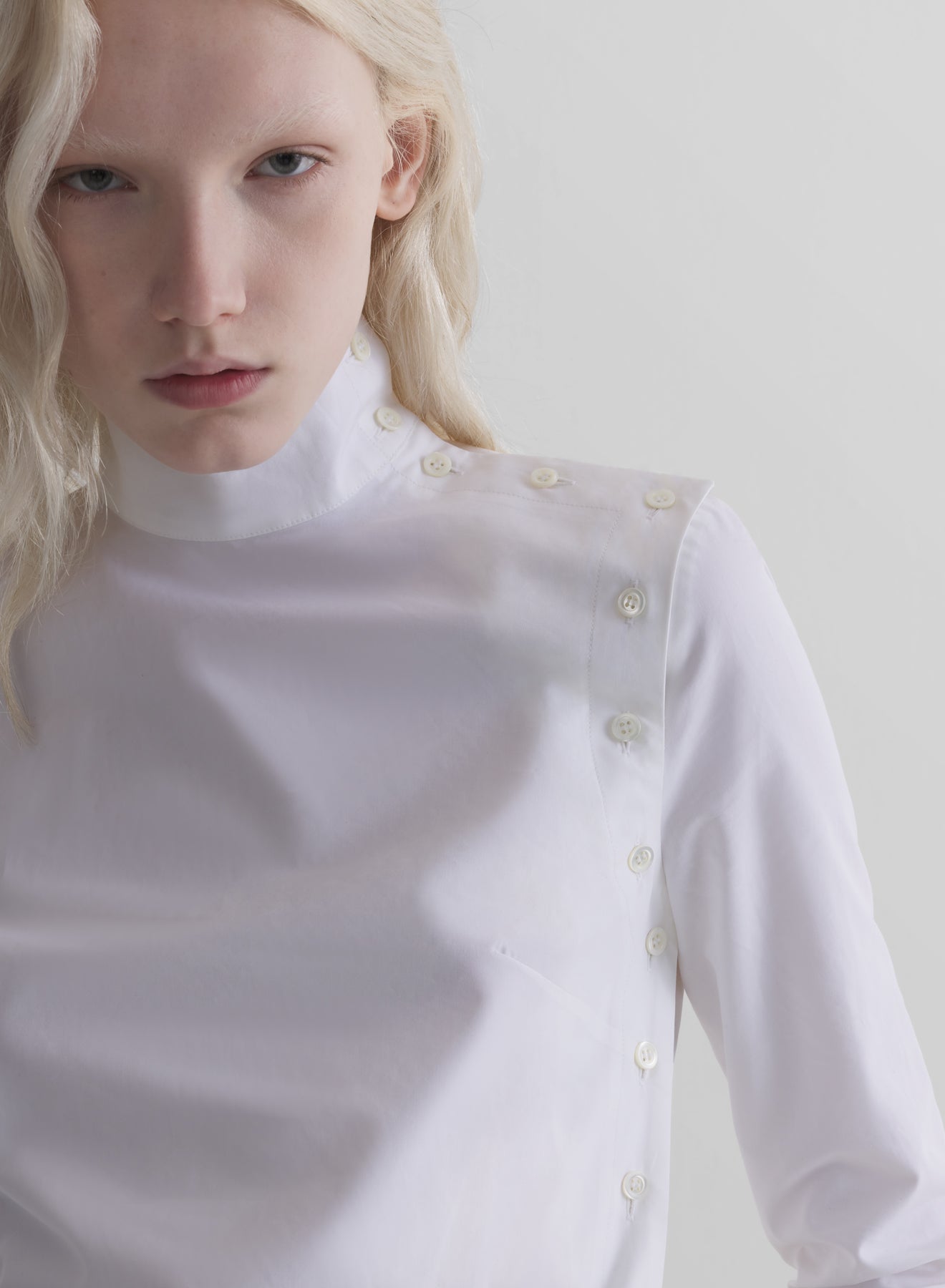 white fencing shirt