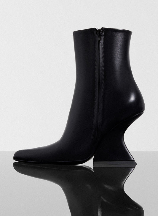 black curved heel ankle boots