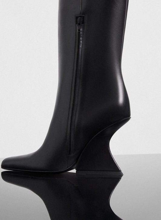 black curved heel knee-high boots