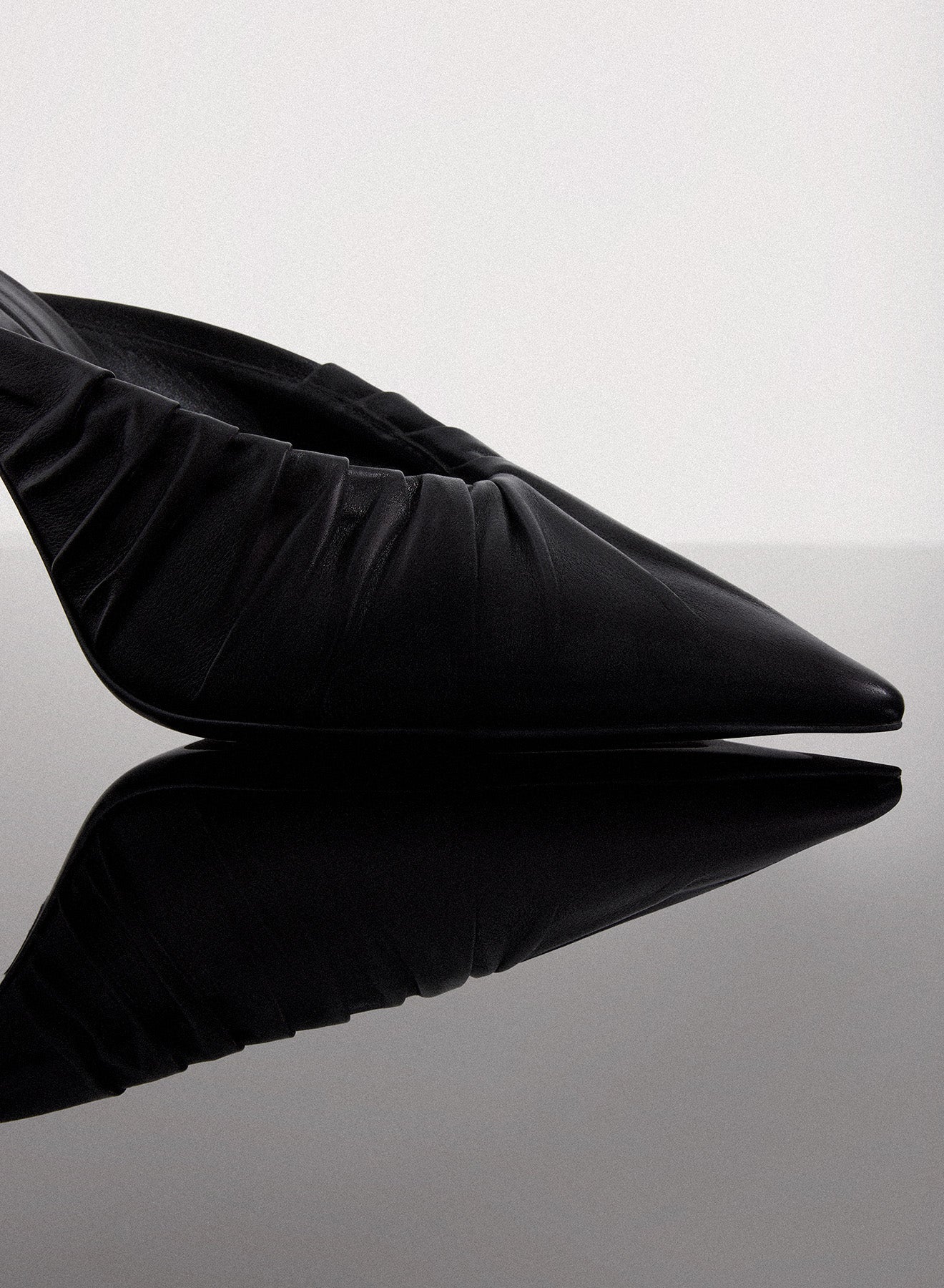 black draped Fang 95 mules