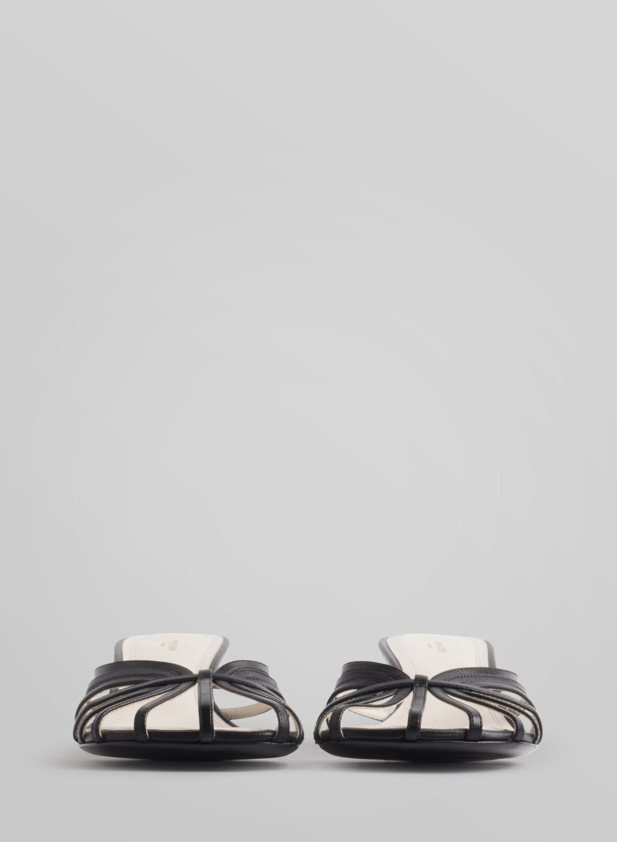 Black knotted strap mules 45
