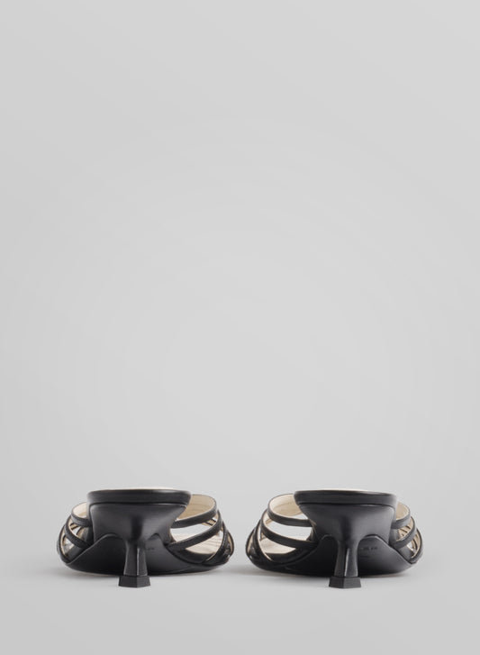 Black knotted strap mules 45