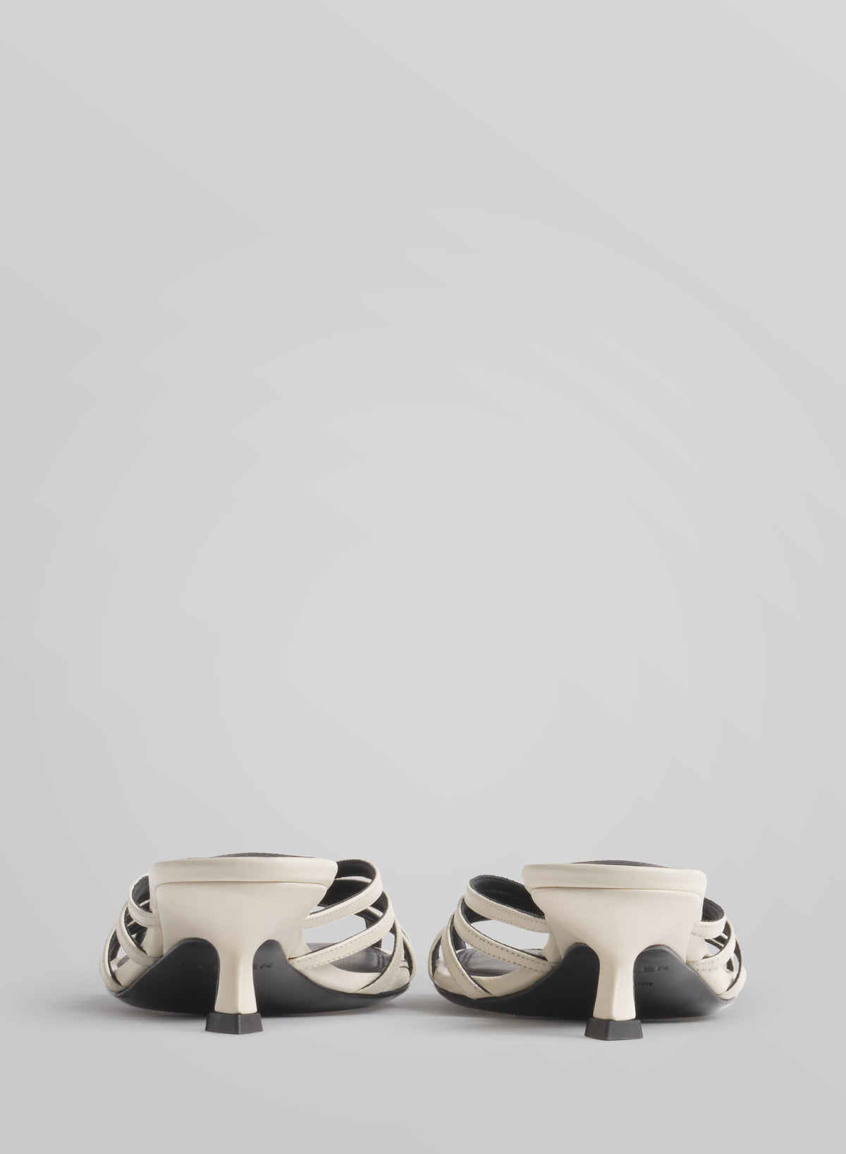 White knotted strap mules 45