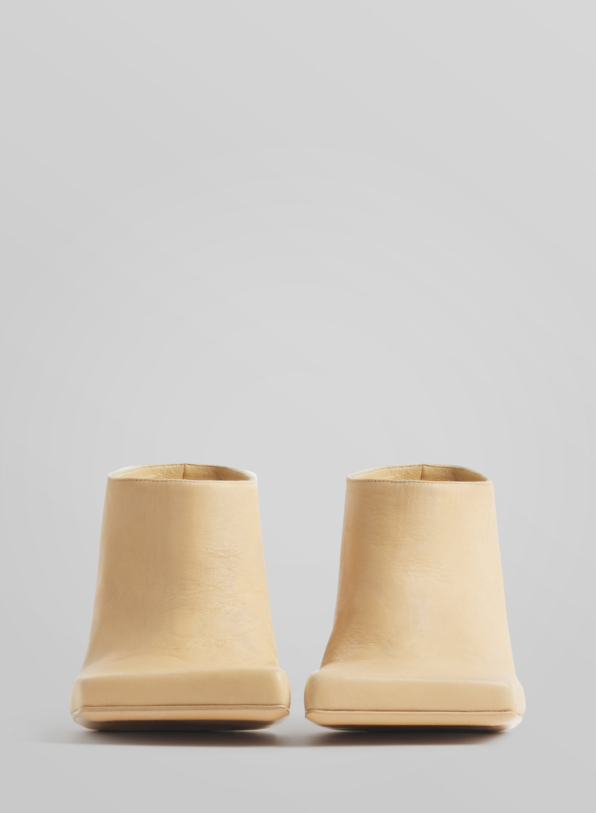 Tan square mules 105