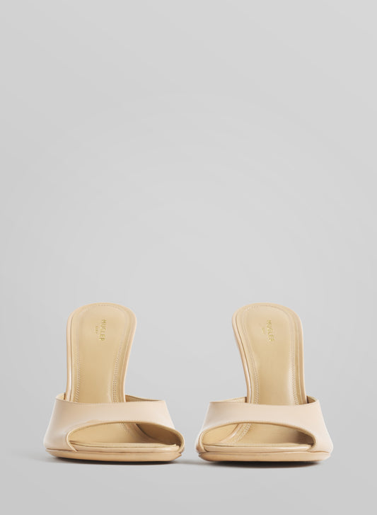 Tan peep-toe mules 105