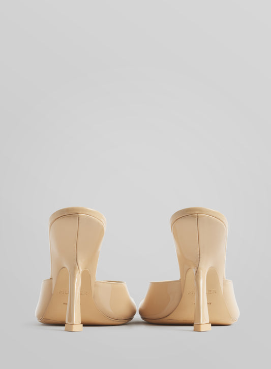 Tan peep-toe mules 105